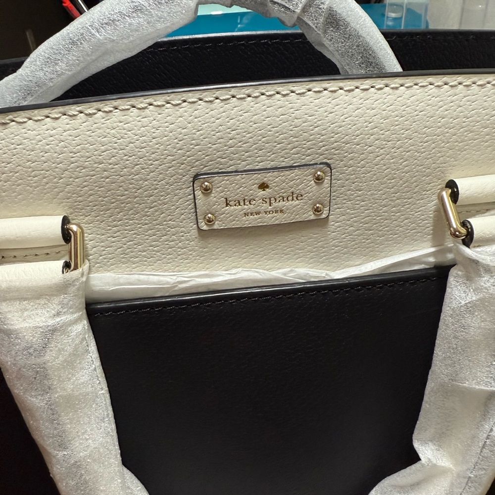Kate Spade Black and White Satchel with Structured Design